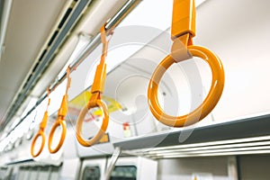 Yellow handrails in Japan train