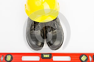 Yellow hard hat and tools