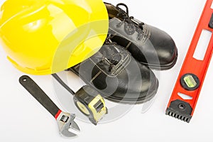 Yellow hard hat and tools