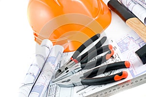 Yellow hard hat and working tools