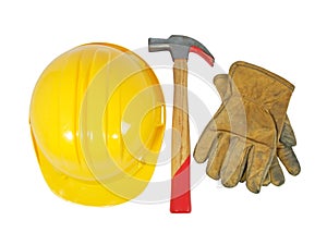 Yellow hardhat, old leather gloves and a hammer