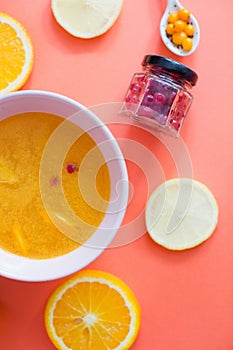 Yellow healthy drink with orange and cranberry. Health food and drink to boost immune system