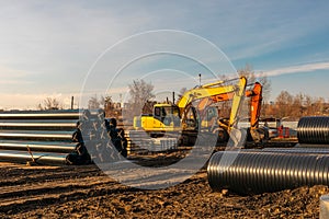 Yellow heavy earth mover. excavator machine on a construction site