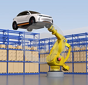 Yellow heavyweight robotic arm carrying white SUV in the assembly factory