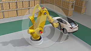 Yellow heavyweight robotic arm carrying white SUV in logistics center.