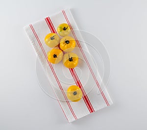 Yellow Heirloom Tomatoes on French Towel