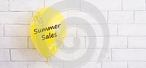 Yellow hellium balloon with summer sale promotion