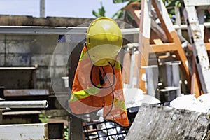 yellow helmet safety in construction site.