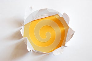 Yellow hole in paper
