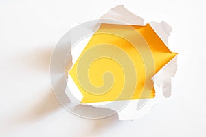 Yellow hole in paper