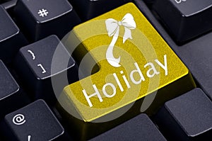 Yellow holiday button on the keyboard