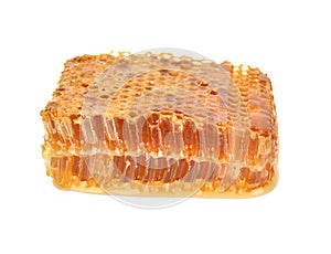 Yellow Honeycomb slice closeup isolated on white background