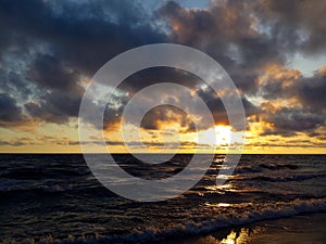 Yellow horizon and heavy clouds