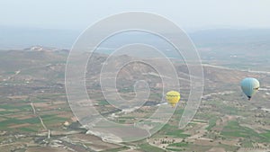 Yellow Hot Air Balloon Flying Over Cappadocia