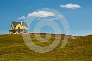 Yellow house in magdalen island photo