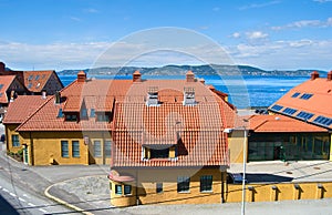 Yellow houses with tile roofs in Bergen, Norway