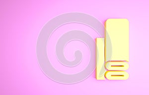 Yellow Indian textile fabric icon isolated on pink background. Roll, mat, rug, cloth, carpet or paper roll icon