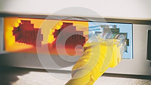 yellow internet cable in blue on the back of the network router