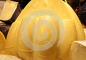 Yellow italian hard cheese called Provolone