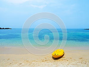 Yellow Kayak boat on tropical island beach bright sun in summer. Koh Kood - Thailand