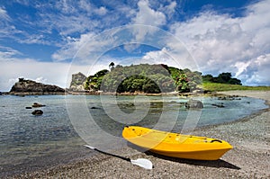 Yellow Kayak on the shore