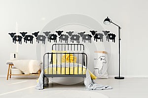 Yellow kid`s bedroom interior