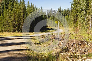 A yellow kilometer marker sign