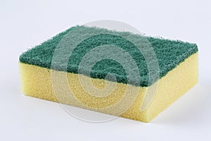 Yellow kitchen sponge against on white background. Scrub yellow sponge design