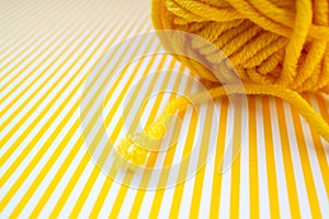 Yellow knitting yarn background