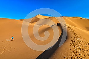 The yellow Kumtag desert and blue sky in Tulufan city