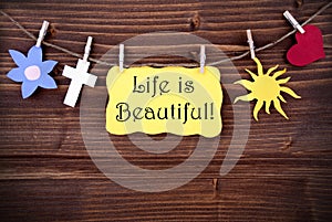 Yellow Label Saying Life Is Beautiful