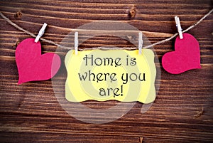Yellow Lable Saying Home Is Where You Are