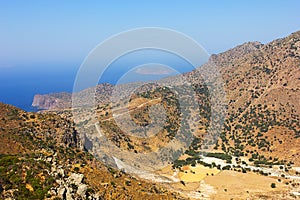 Yellow landscape of Nisyros volcano. View of the caldera, a crater with sulfur crystals