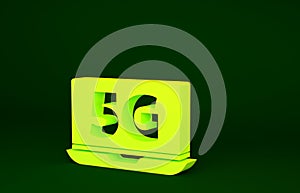 Yellow Laptop with 5G new wireless internet wifi icon isolated on green background. Global network high speed connection