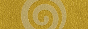 Yellow leather and a textured background, wide banner