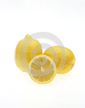 YELLOW LEMON citrus limonum AGAINST WHITE BACKGROUND