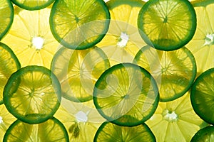 Yellow lemon and green lime slices