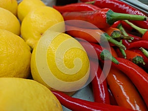 yellow lemon and red chilly peppers