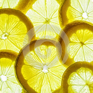 Yellow lemon slices isolated on a white background