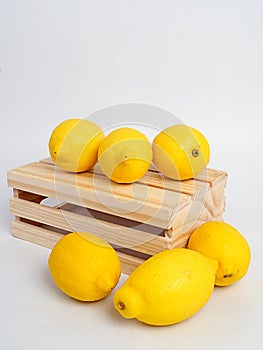 Yellow lemon and wood box