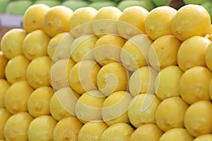 Yellow lemons background and pattern