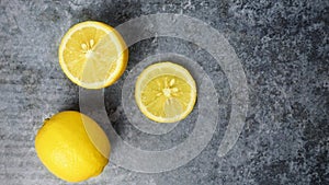 Yellow Lemons on gray concrete table