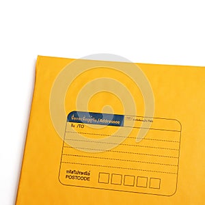 Yellow letter envelope isolated over white