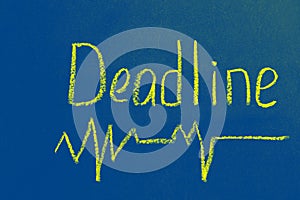 Yellow lettering on blue deadline board with curve dash