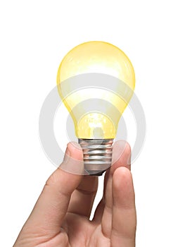 Yellow light bulb in hand