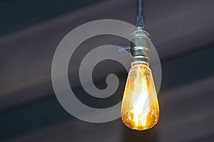 Yellow light bulb isolated on black background 2 right