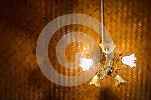 Yellow light on the room ceiling