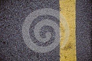 yellow line on asphalt background texture
