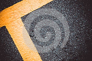 yellow line on asphalt background texture