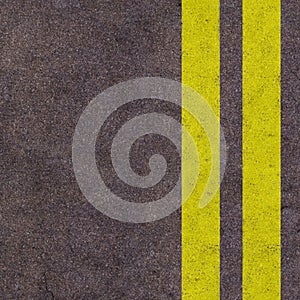 Yellow lines on the asphalt road